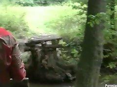 Two hot redhead and brunette bitches have a catfight in mud