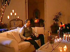 Julia Ann fucks a hot stud by the fire