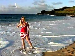 Curvy Alison Angel shows her boobs on a beach
