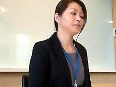 Oriental Mature donna jerks inside A Office