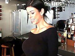 Barmaid with huge round tits!
