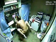 Hidden cam captures this amateur couple fucking in back room