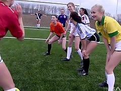 Soccer girls practicing and stripping down on the soccer field