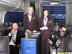 Two stewardesses get fucked by two business class passengers
