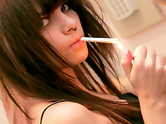 Teen girl smokes while stripping