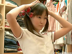 Asian teen dresses as schoolgirl