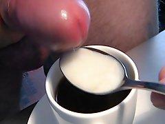 Cumshot closeup uncut cock foreskin sperm jerkoff coffee sperm cookie