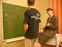 Mature teacher is seducing her student