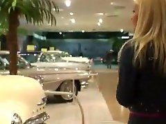 Stunning Sophie Moone walks around the car exhibition