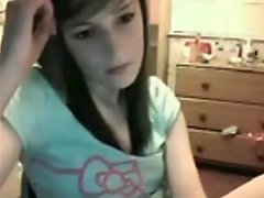 Playing with her cute pussy on webcam