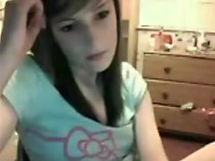 Playing with her cute pussy on webcam