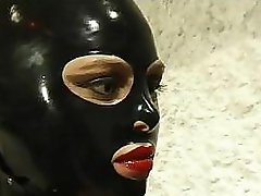 Hot cat woman in leather suit does anything she wants to her horny slave