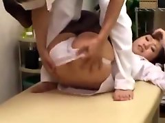 Office Lady Getting Her Small Tits And Pussy Rubbed By The Masseur On The Massage Bed