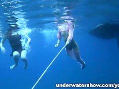 Nastya and Masha are swimming nude in the sea