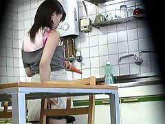 Caught woman masturbates in kitchen