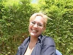 Mature in glasses laid outdoors