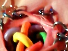 Extremely bizarre pierced vaginal insertions