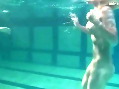 Naked chicks have some fun underwater