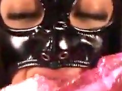 Masked Japanese babe in Leather Outfit Is shaged By Some Dudes.
