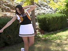 She is a slutty cheer leader flashing her stuff 